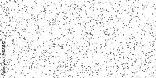 White background with scattered small irregular grayscale geometric shapes creating a subtle speckled or mosaic texture for design elements