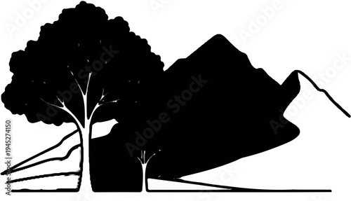Silhouette of a large tree, small sapling, and mountainous backdrop