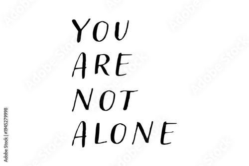 You are not alone - You are not alone words on white background, calligraphy, handwritten, vector
