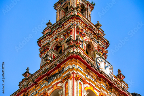 Detail of the bell tower of the church of Santa María de la Encina and San Juan Bautista in Burguillos del Cerro, Badajoz, Extremadura, Spain