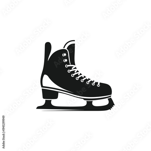 A black ice skate with white laces on a plain surface