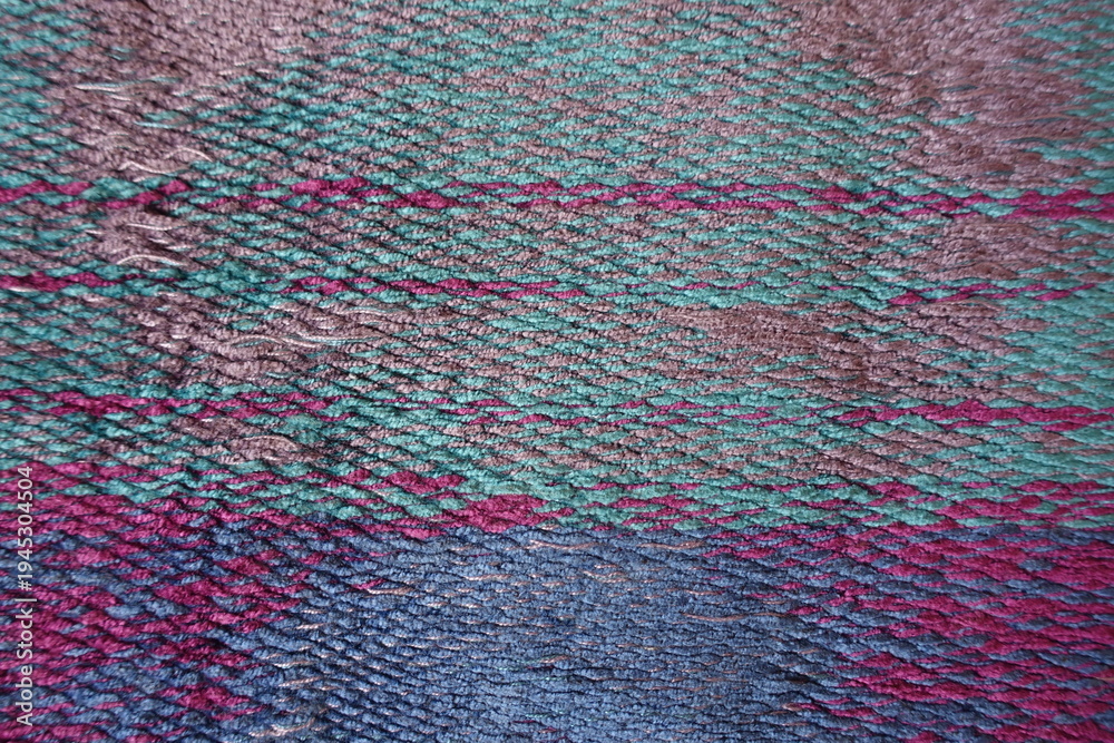 Obraz premium Vibrant and colorful textured melange fabric texture