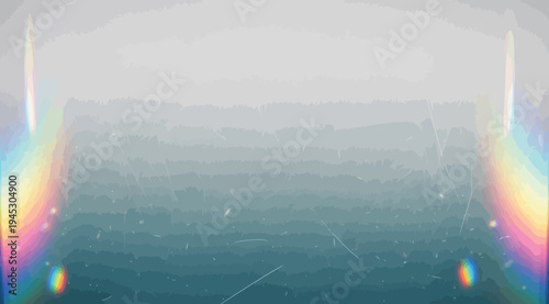 Holographic rainbow effect on a foggy landscape with a mountain range in the distance and a white border at the bottom