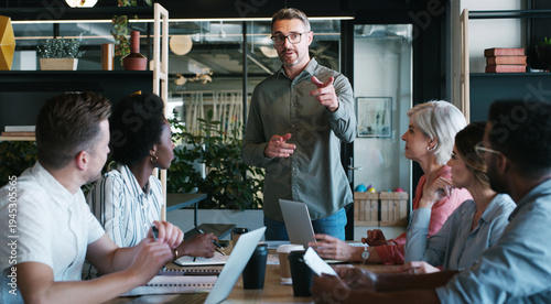 Photos Business, team and man with meeting in office for editorial guidance, writing advice or feedback