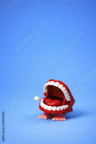 a toy mouth showing a heart tongue