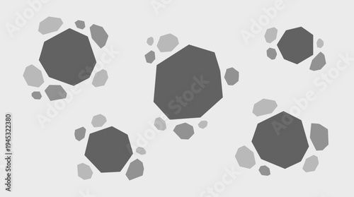 Abstract illustration of dark grey irregular polygons surrounded by smaller light grey irregular shapes on a light background.