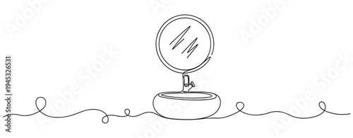 Makeup mirror standing open on continuous line background