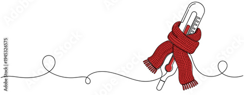 Thermometer wrapped in scarf indicating cold temperature concept