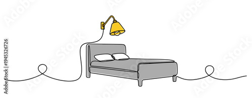 Double bed placed in minimal bedroom with wall lamp