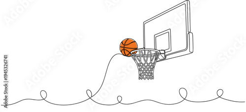 Basketball entering hoop over mounted backboard on court