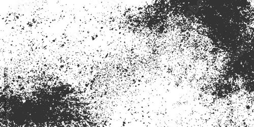 A dark speckled splattered texture abstract background, the raw, gritty, imperfect beauty of a speckled ink background, offering a visually captivating backdrop for design and imagery. 