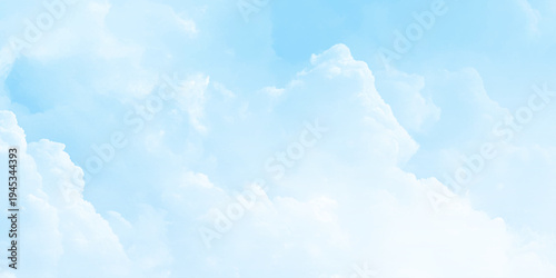 Beautiful blue sky background with clouds. Wispy clouds dancing in clear sky