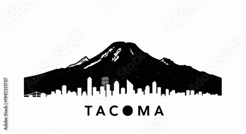 Silhouette of a snow-capped mountain overlooking a city skyline and bridge