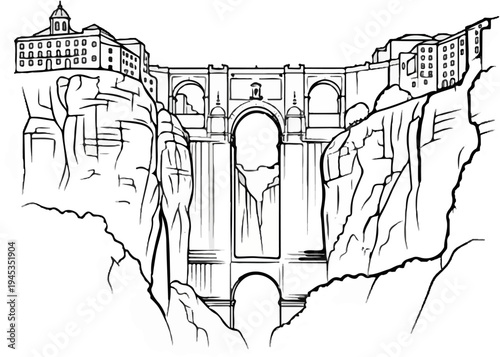 Historic bridge spanning a deep gorge with buildings on clifftops