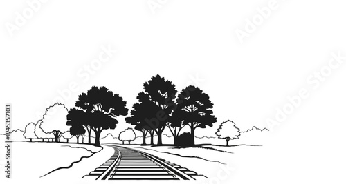 A silhouetted train track curves through a grove of trees