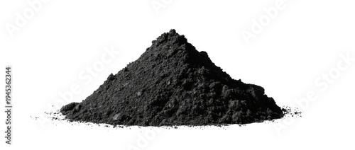 A close-up shot of a dark gray or black pile of granular material, set against a black background