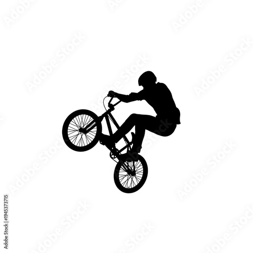 Black Silhouette of a Biker Performing a Stunt on a Bmx Bike