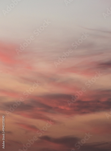 Moody dark purple clouds with a deep fiery orange base