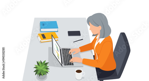 woman working on laptop at desk.