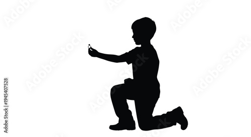 Boy kneeling and proposing with a ring dramatic silhouette