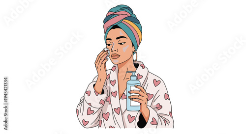 Beautiful woman in a bathrobe and colorful headwrap cleans her face with a cotton pad using liquid skincare product from a bottle.