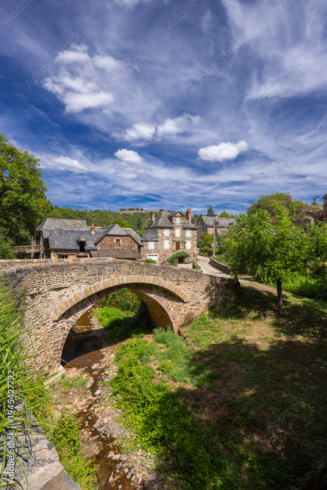 Fototapeta premium Sebrazac village stone bridge crossing stream