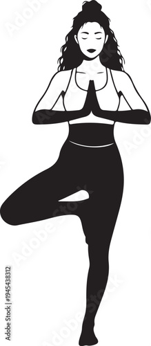 Woman performing tree pose variation in yoga attire with hands in prayer position