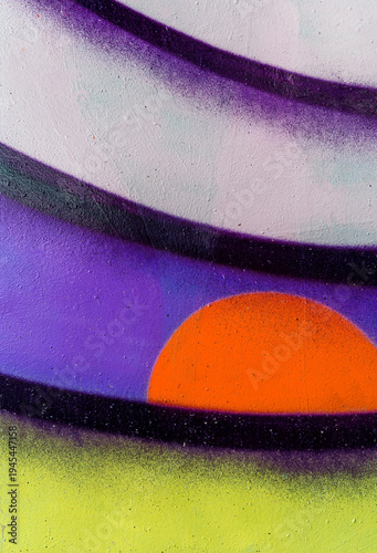 abstract graffiti background of urban aerosol painting pattern. Colorful artistic backdrop of city brush drawing lines on the wall