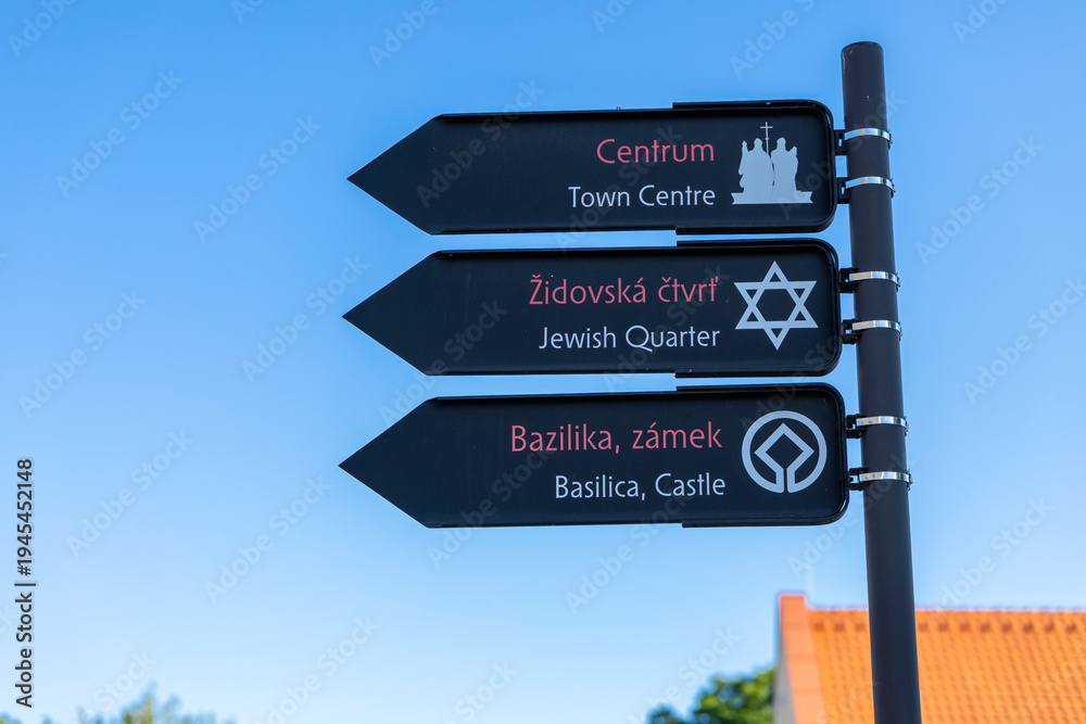 Ταπετσαρία Directional sign pointing to Jewish Quarter and Basilica in Trebic