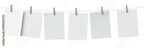 Blank white cards hanging on a string with clothespins