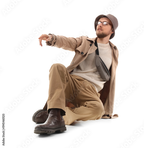 Stylish young man in trench...