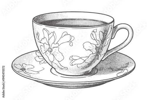 Vintage teacup and saucer with floral filled with dark liquid black