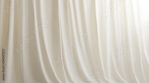 Elegant Off-White Fabric Drapes Flowing Vertically, Showcasing Soft Textures and Gentle Light Folds
