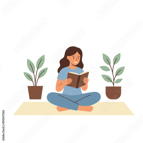 Woman sitting on a mat reading a book surrounded by plants indoors