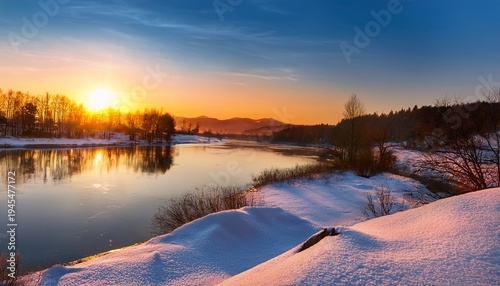 Late Winter Landscape With Melting Snow And Warm Sunset Over A Calm River