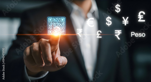 Business professional activating financial and tech icons on a holographic screen