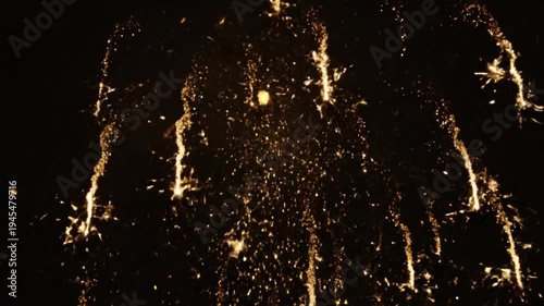 Fireworks exploding in the night sky.