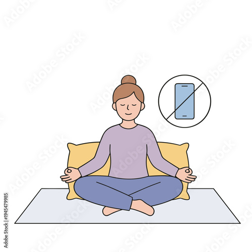 Woman meditates peacefully on a mat indoors with her phone off