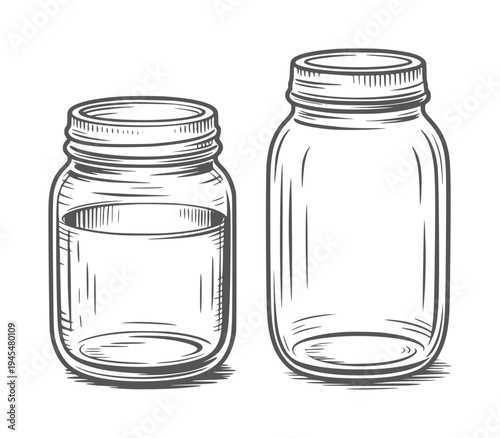 Two empty glass mason jars black and white line lids