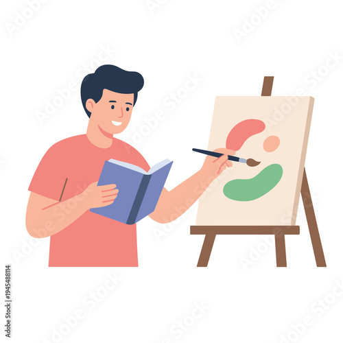 A man is painting on a canvas while holding a book in an indoor setting.