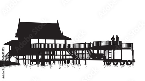 Stilt house with traditional roof and walkway on water with two people silhouettes observing the view.