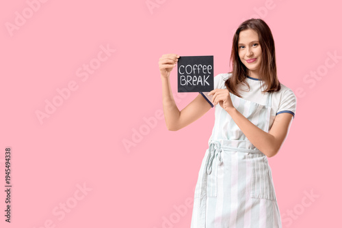 Young female barista with t...