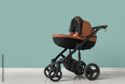 Modern baby stroller near b...
