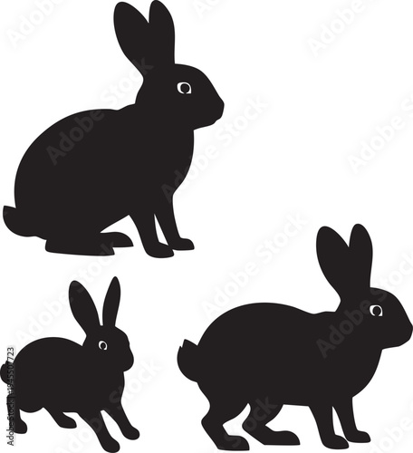 Black silhouettes of three rabbits on white background