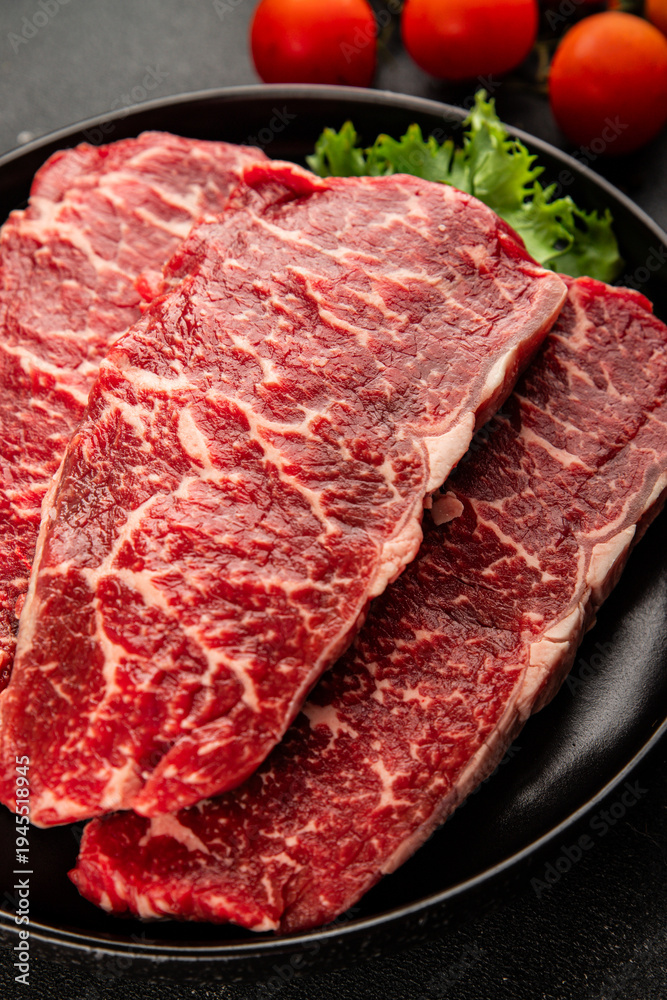 Fototapeta premium Raw beef steak marbled meat veal tasty snack fresh delicious gourmet food background on the table rustic food top view copy space