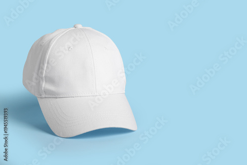 Blank white cap on blue bac...
