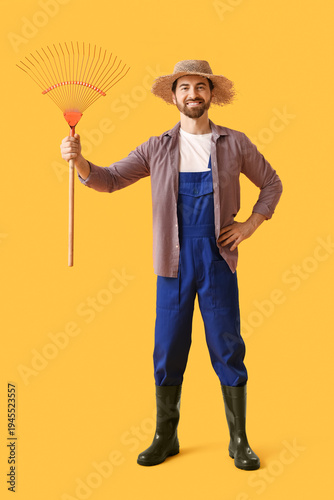 Young happy male farmer wit...