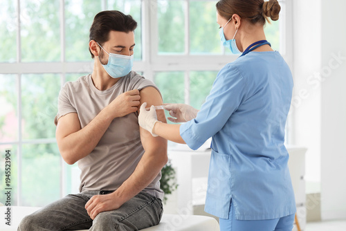Young man with doctor apply...