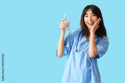 Female Asian doctor with gl...