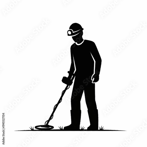 Silhouette of a person metal detecting in a field.